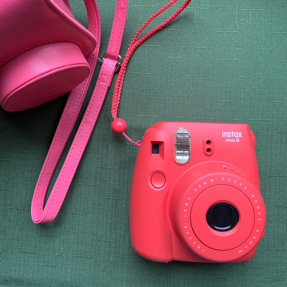 Instax Polaroid camera with carrying purse